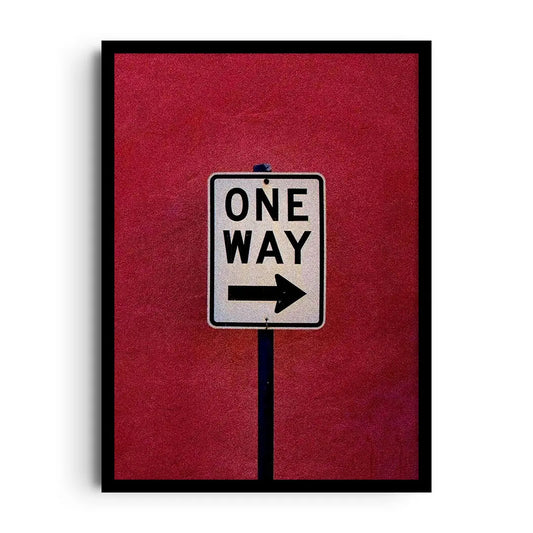 Framed poster of a bold one-way directional arrow graphic with strong contrast, modern motivational wall art