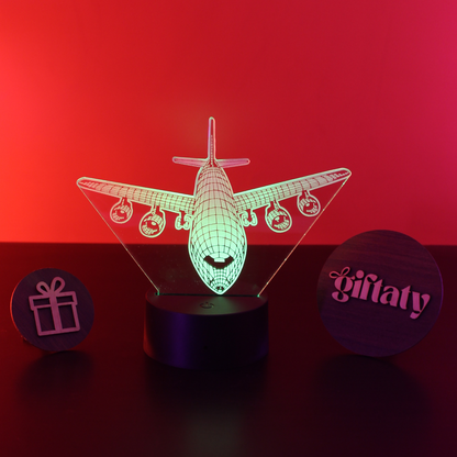 3D airplane-shaped night light on a red background with 'giftaty' branding.