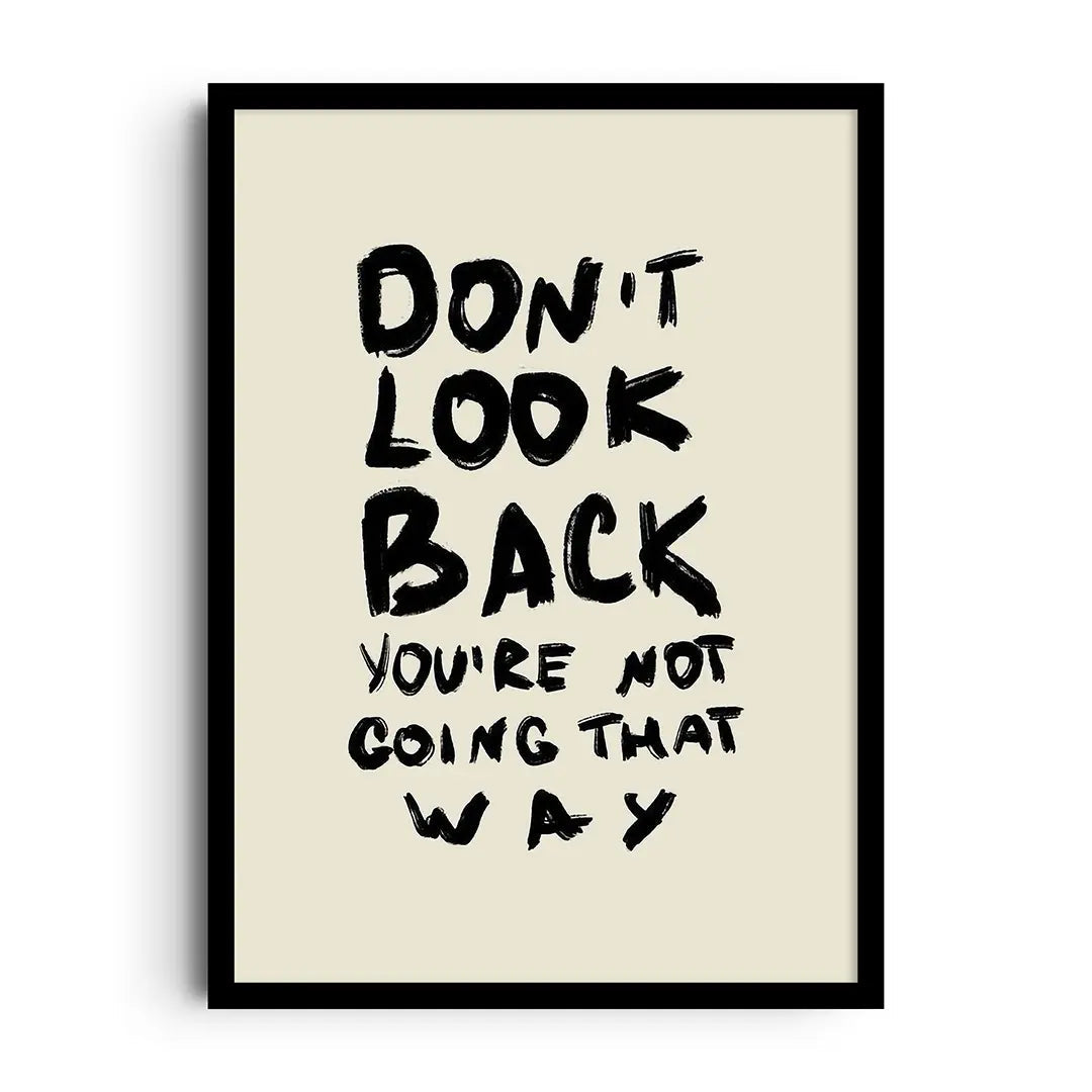 Framed poster with bold minimalist typography reading Don't Look Back on a subtly textured background
