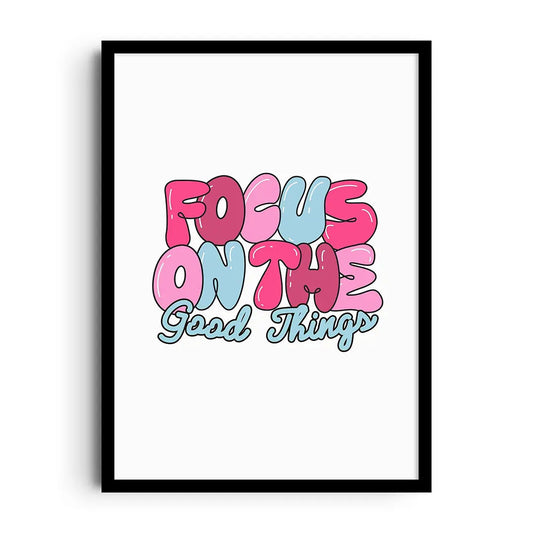 Framed motivational poster reading Focus and Flourish with modern lettering and delicate botanical leaves