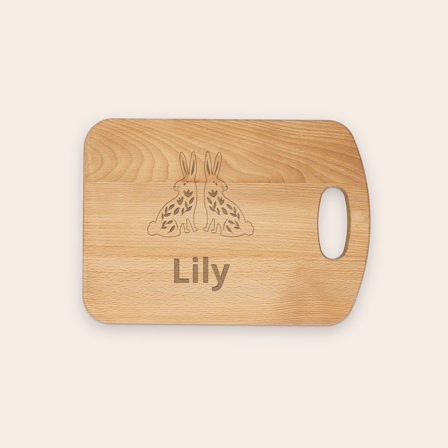 Solid beech wood bread board, close-up detail, with customized text engraving