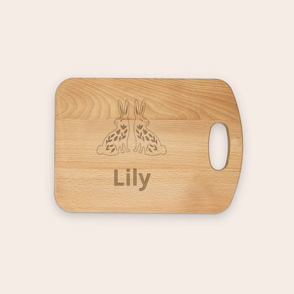 Solid beech wood bread board, close-up detail, with customized text engraving