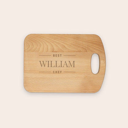 Oiled beech wood chopping board, close-up detail, with customized engraved text