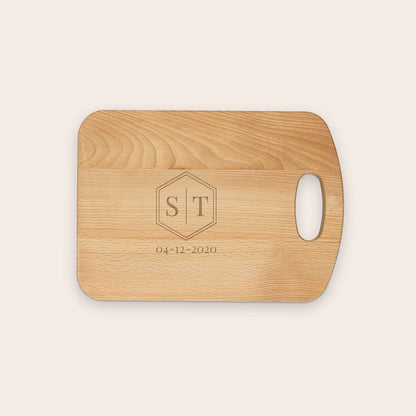Oiled beech wood chopping board, shown from another angle, with customized engraved text