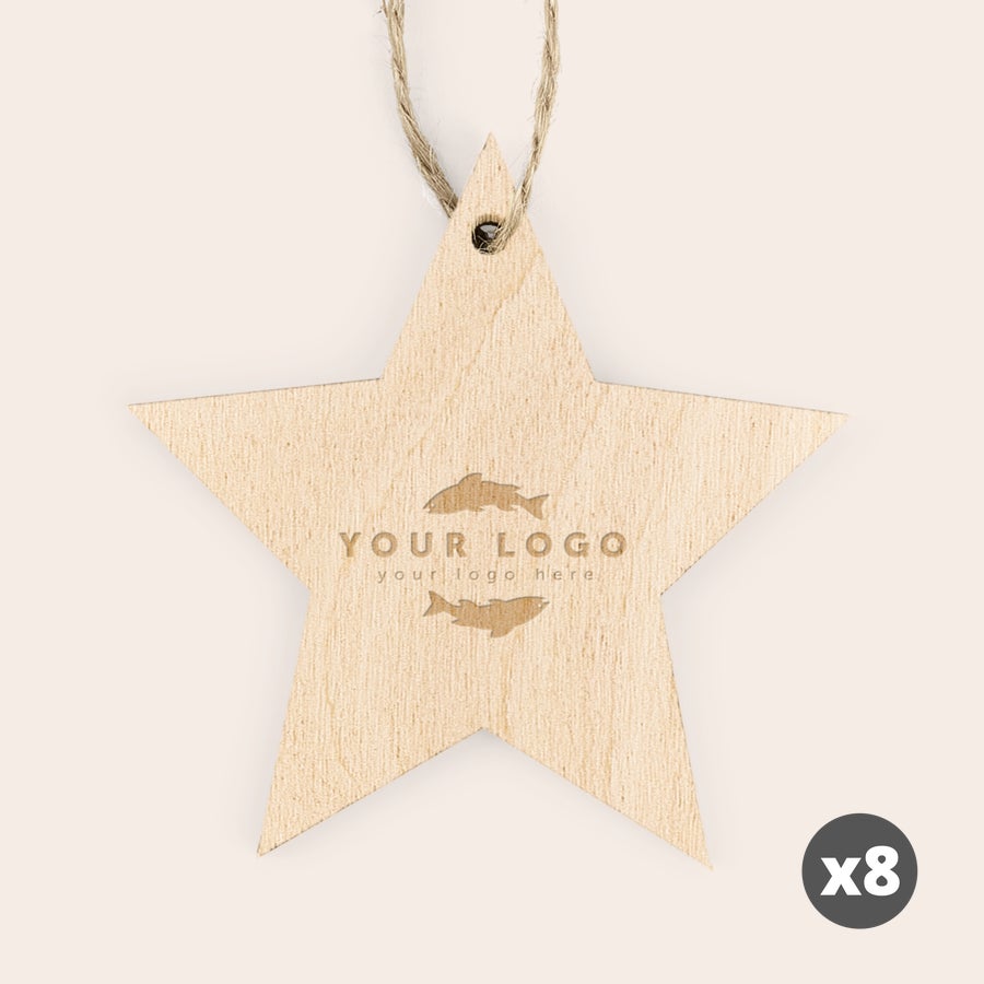 Set of engraved wooden Christmas stars with personalized text example