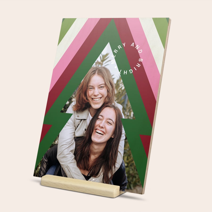 Plywood Christmas card on wooden stand, alternate view, customized with a festive photo and text