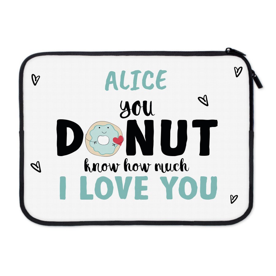 Customized laptop sleeve with laptop inside showing personalized printed side