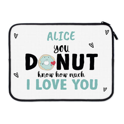 Customized laptop sleeve with laptop inside showing personalized printed side