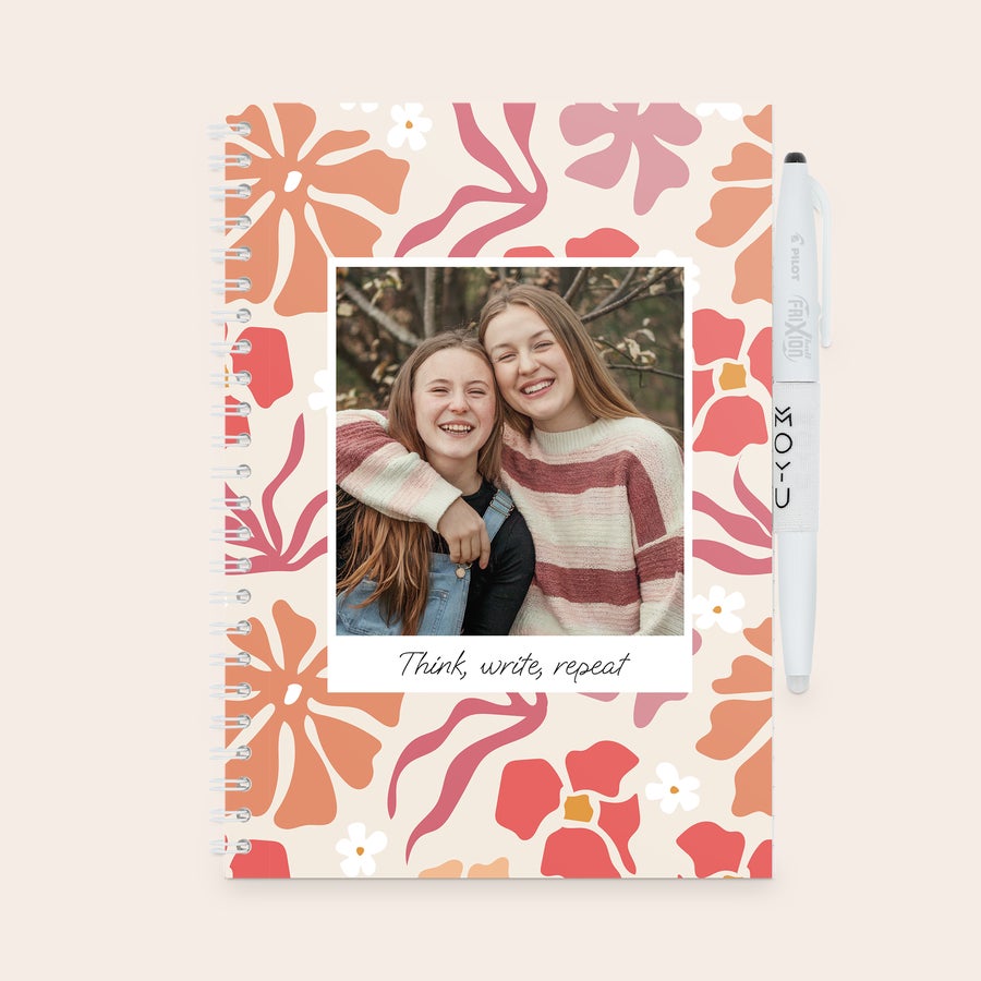 A5 notebook, shown from another angle, with a customized photo and text cover