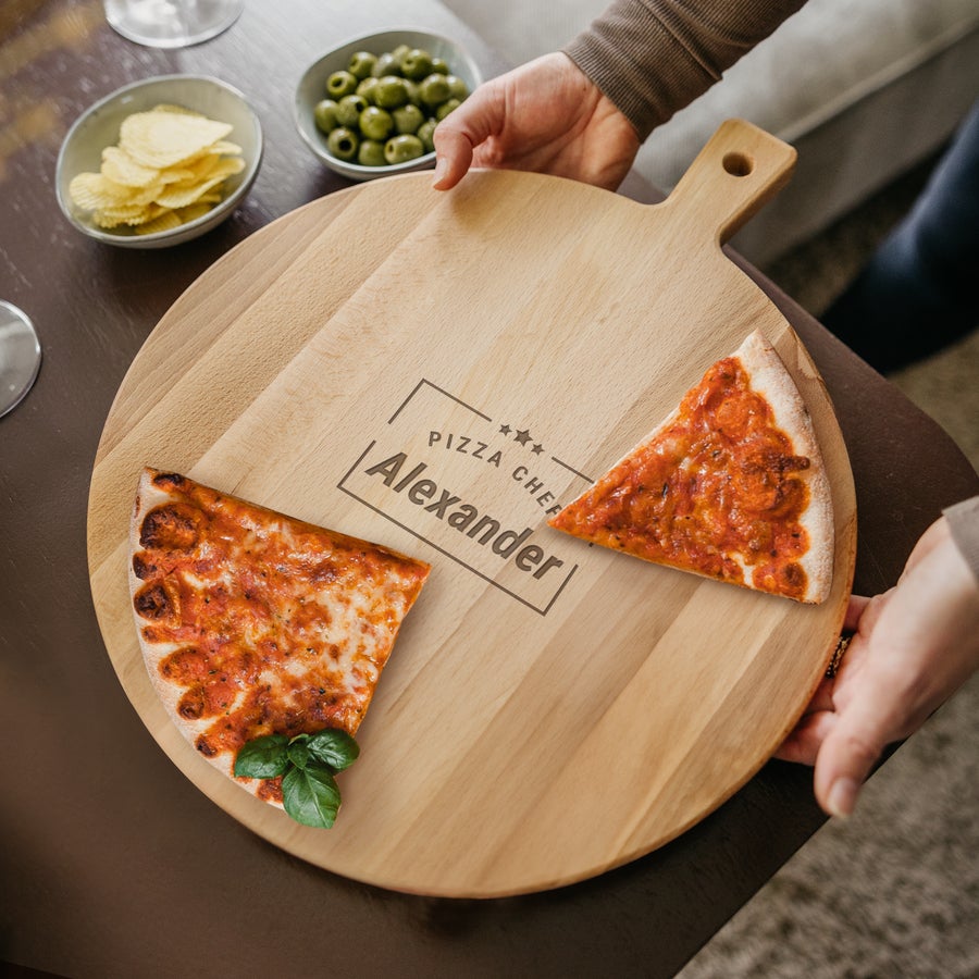 Round beech wood pizza board with handle, alternate view, and customized text engraving