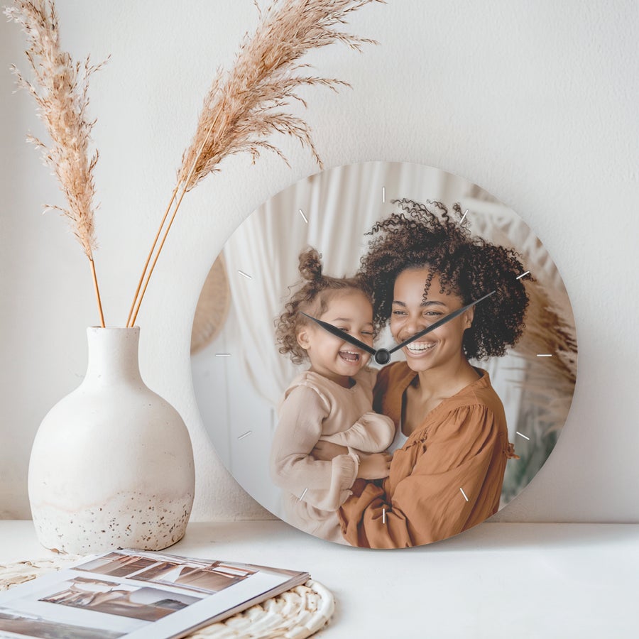 Personalized round photo clock gift by Giftaty with a custom photo