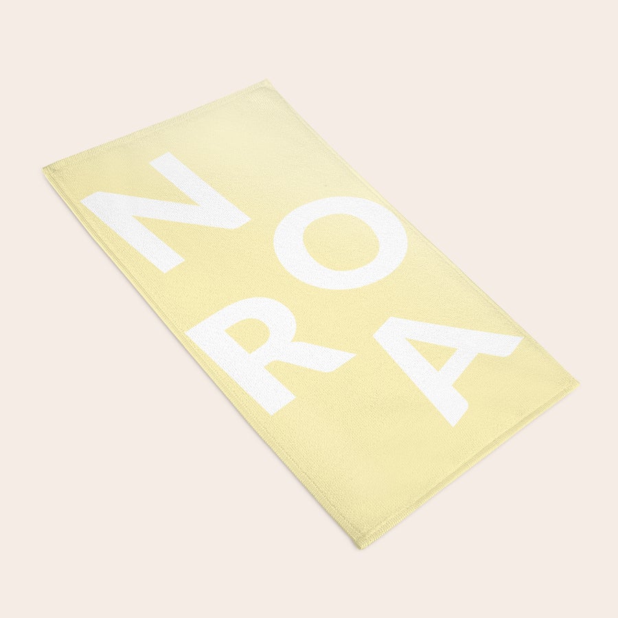 Custom name towel with colourful printed design by Giftaty